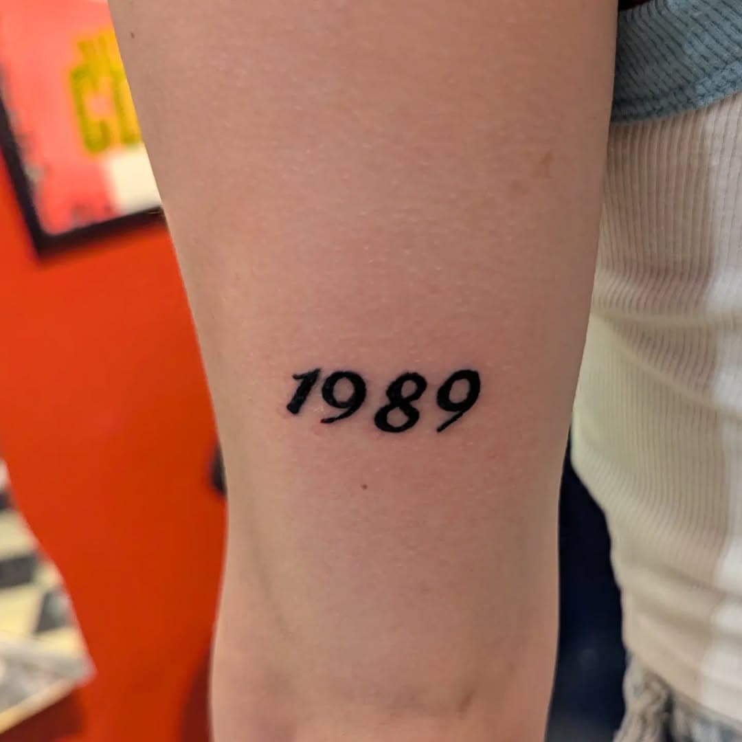 Taylor Swift tattoo by @clash_city_baz 
#swifties #taylorswift #1989 #tattoosonwomen #tattooideas #tattoostoday #1989 #eastvillage #nyc #erastour #smalltattoo