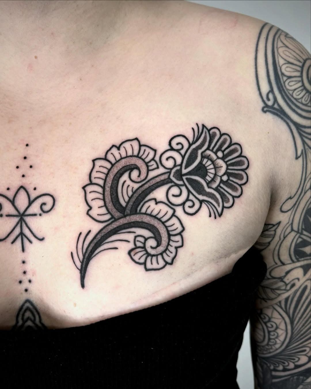 ✱ FLWRS on chest ✱
Thank you very much for the trust krissi ✨
Done at @elysiumtattoosheff .
—————————————
🧧To book or for any inquiries, follow the link in my bio or email to LMTtattoo@gmail.com. 🧧
—————————————
RESIDENT AT
@sacredgoldtattoo 
•Taking bookings•
@redinctattoo 
•Taking bookings•
@electric_punch_tattoo 
•Taking bookings•
—————————————
GUESTS & CONVENTIONS

✱ SHEFFIELD 5th-8th March @elysiumtattoosheff 
•Taking bookings•
✱ LEEDS tattoo expo 7th -8th June @leedstattooexpo 
—————————————
.
.
.
.
.
.
#londontattooartist #blackwork #redinctattoo #sacredgoldtattoo #trad #traditionaltattooink #traditionalornaments #traditionaltattoo #flashaddicted #blackworkartists 
#blackwork #leeds #hoddesdon #electricpunchtattoo