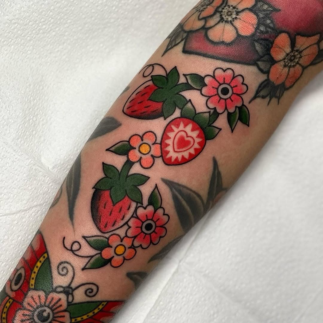 Perfectly fit strawberry 🍓 filler by @threeseastattoo 
.
#454tattoo #tattoo #tattooshop #colortattoo #strawberrytattoo #strawberry #localtattooshop #encinitas #leucadia #tattoofiller #traditionaltattoo