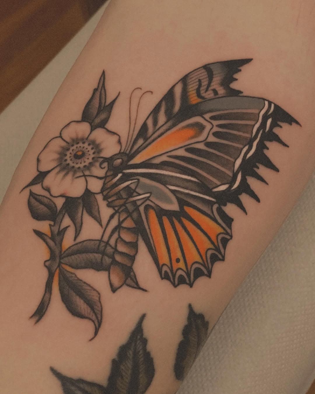 Butterflies carry a deep symbolism, freedom, transformation, and the fleeting beauty of life. It was a real pleasure to tattoo this monarch butterfly on Tristan, who had a clear vision for this project.

We chose strong contrasts and vibrant orange tones to give this design a timeless impact. The addition of the flower complements the butterfly’s delicate yet resilient nature.

Big thanks to Tristan for trusting me with this piece. It’s always inspiring to work with clients who share my passion for meaningful designs.

*************************** 
For tattoo appointments email:
adrien.tender@gmail.com
***************************

#ButterflyTattoo #TattooArt #TraditionalTattoo #InkLife #TattooArtist #BoldDesign #TattooCommunity #TimelessTattoo #CustomTattoo #BodyArt #InkedForLife