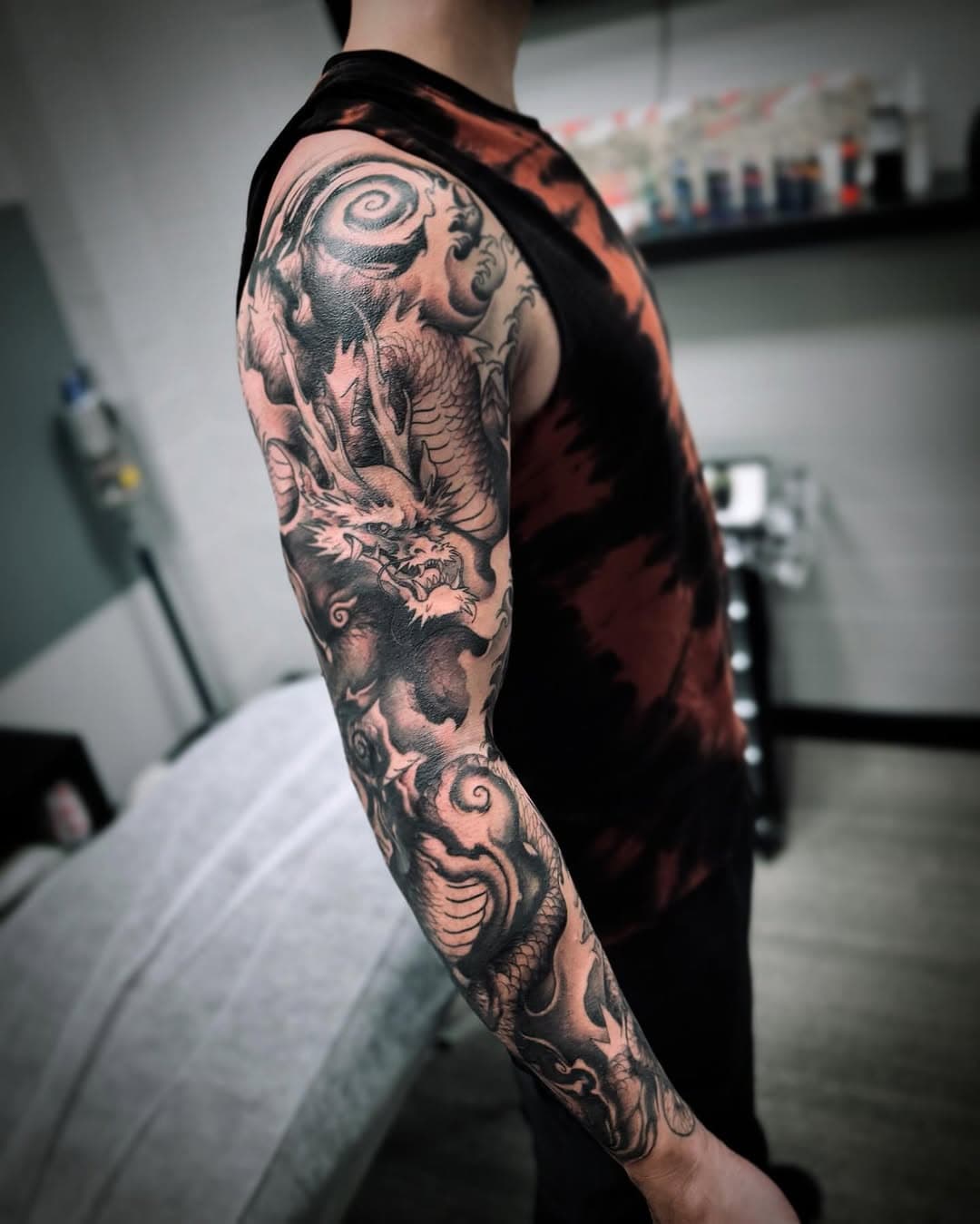 Finished this project for @ryukikitsune - just some finishing touches we can do in the future on the scales/background. Thanks so much for all the hours spent to create this piece. Been so fun to see it come to life… 🐉 
Booking February and March now, really keen to do more large scale projects in the future 📧 contact@hachitattoo.com.au to book a consultation and get started.
.
.
.
.
#tattoo #tattooartist #dragontattoo #tattooedmen #inkedup #tattooartistmagazine #irezumicollective #tattoodo #tatuagem #irezumitattoo #dragon #blackandgreytattoo #blackwork #inkedtattoo #btattooing #finelinetattoo #darkartists #perthartist #perthisok #tattooart #customtattoo #illustrative #hachitattooperth