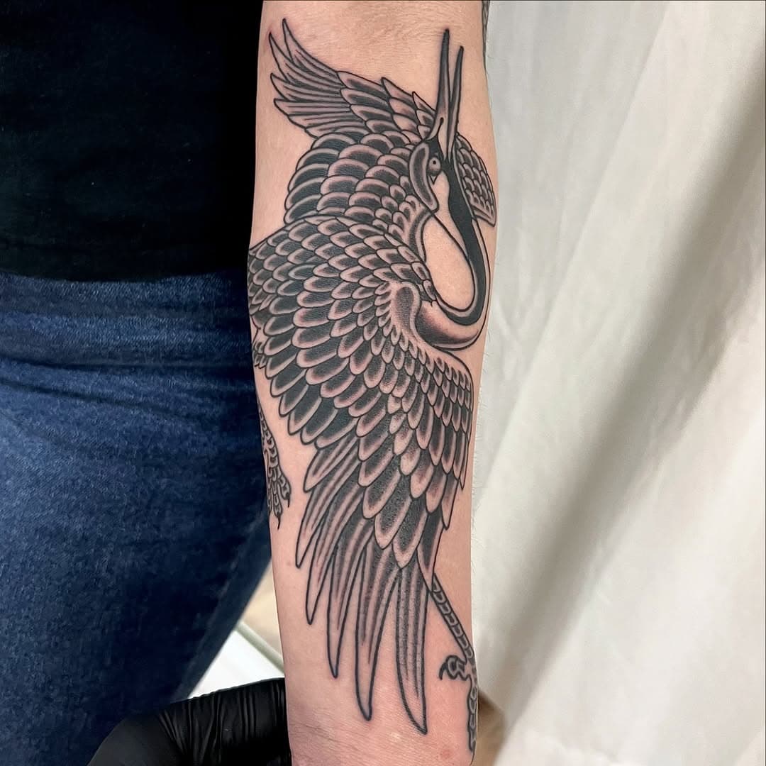 Crane beneath a healed dragon from @nate_mcgaughy 

Shop will be CLOSED today for snow but we’ll be back tomorrow! Nate has time the rest of the week to make your dreams come true. Contact Nate to book yours