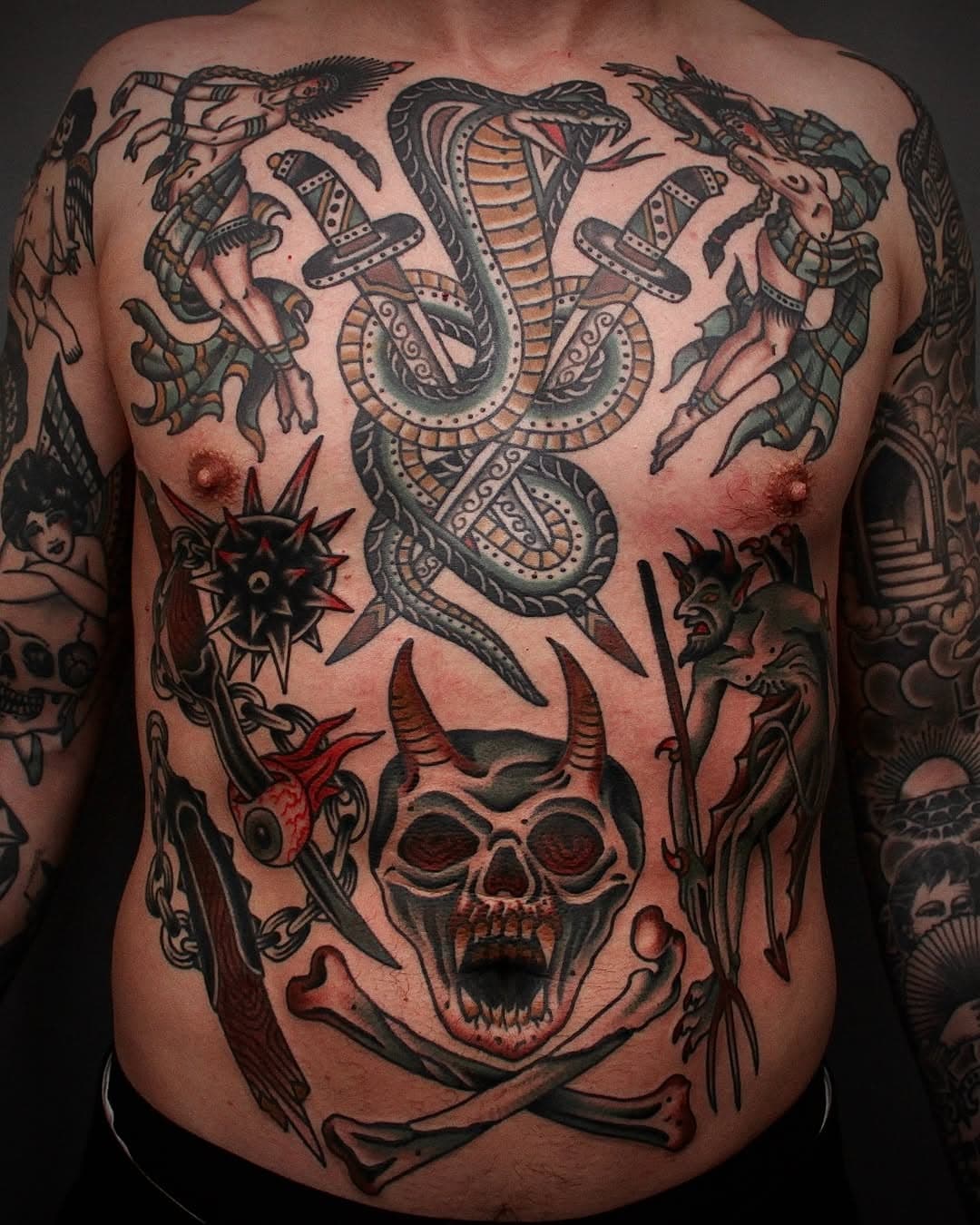 Adrian's front piece all done. Center snake by Hanse. Tack!