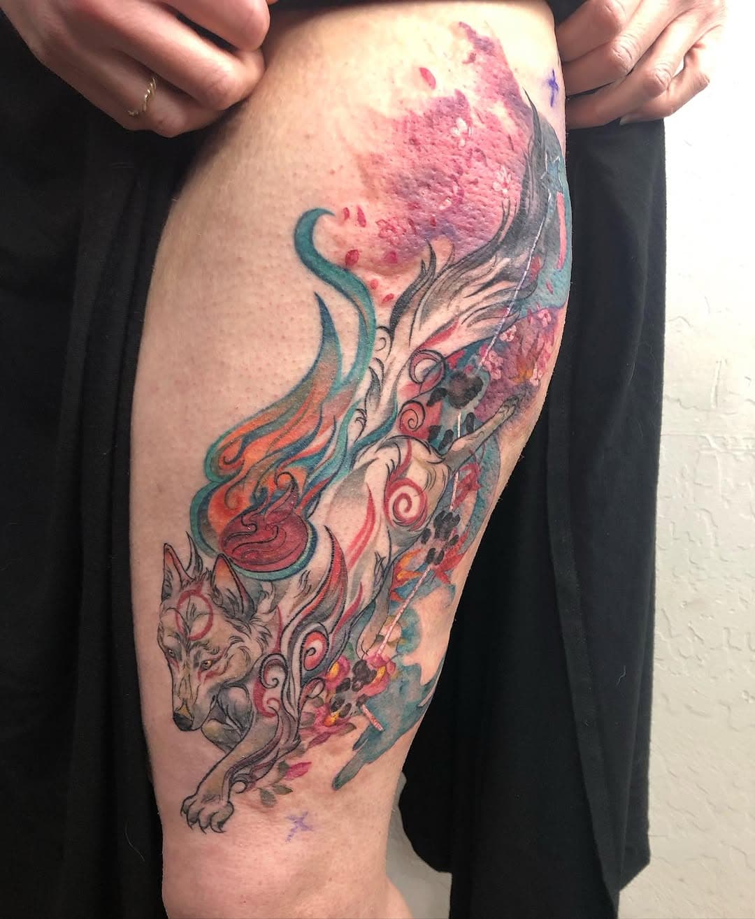 What a fun project! The Okami wolf is healed; her watercolor trail of flowers and dragon constellation is fresh. She had the brilliant idea of having her pet’s paw prints in place of the stars, I love how it came together. Thanks Jena! #austinwest #revivalartcollective #okami #okamitattoo