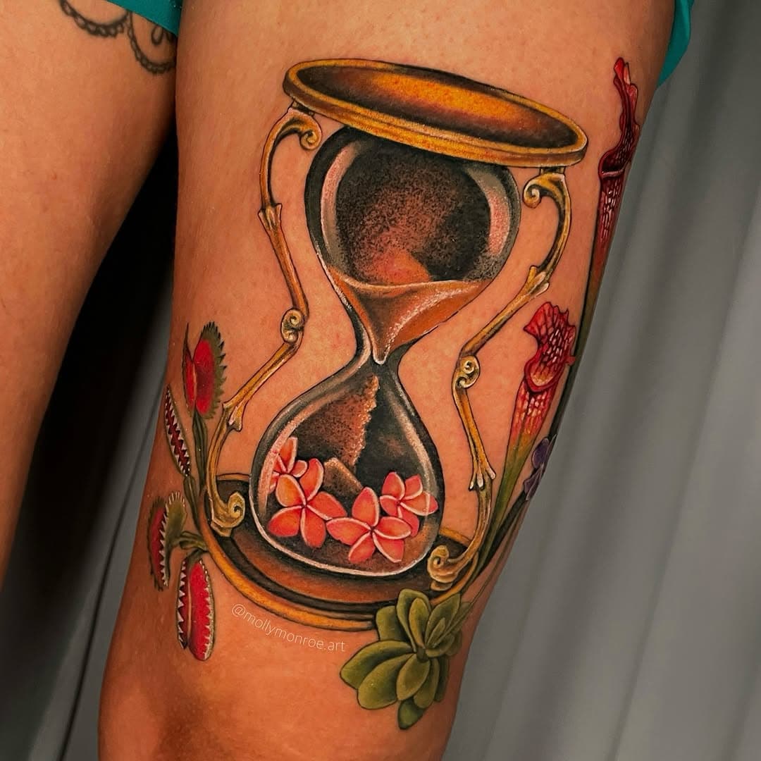 So many pieces I never posted pictures of 😭 This one was from September! Prompt was: plumerias in an hour glass and carnivorous plants; “plants take up all my time” Thank you Kenia! Swipe for details and a progress pic (completed in two full day sessions) 
.
.
.
#tattooartist #colortattoo #texastattooartist #texastattoo #sanantonio #sanantoniotexas #austintexas #austintattooartist #houstontattooartist #dfwtattoos #dallastattooartist #satx #botanicalillustration #botanicalart #illustrativetattoo #colortattooartist #carnivorousplants #venusflytrap #pitcherplant #hourglasstattoo