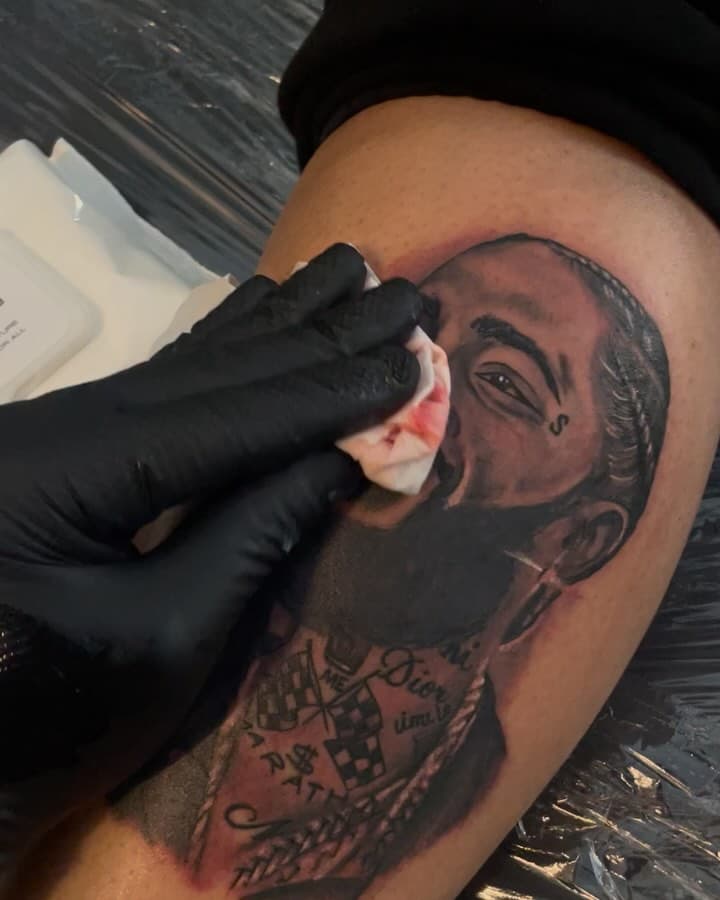 💙💙Dat boy Nip !💙💙 Rest in peace a legend ! Check it out ! Ask about our Half a day sessions starting at $600.00 / also Full day sessions $1100.00 tap in 💉Check it out 💉. Thanks for viewing 🙏💯 Follow @celebinkstudios  #artist #art #atlink #atlantaink #tattooartist #tattoos #atl #atlanta #ga #georgia #eternalink #atltattooshop #atltattoos #freehand #brownskin #bookme #hmu #tatted #tats #explore #explorepage #ig  #inky #atlantaink #celebink #brownkin * #viral #bookme #flowers #love #god *I do not own rights tho music