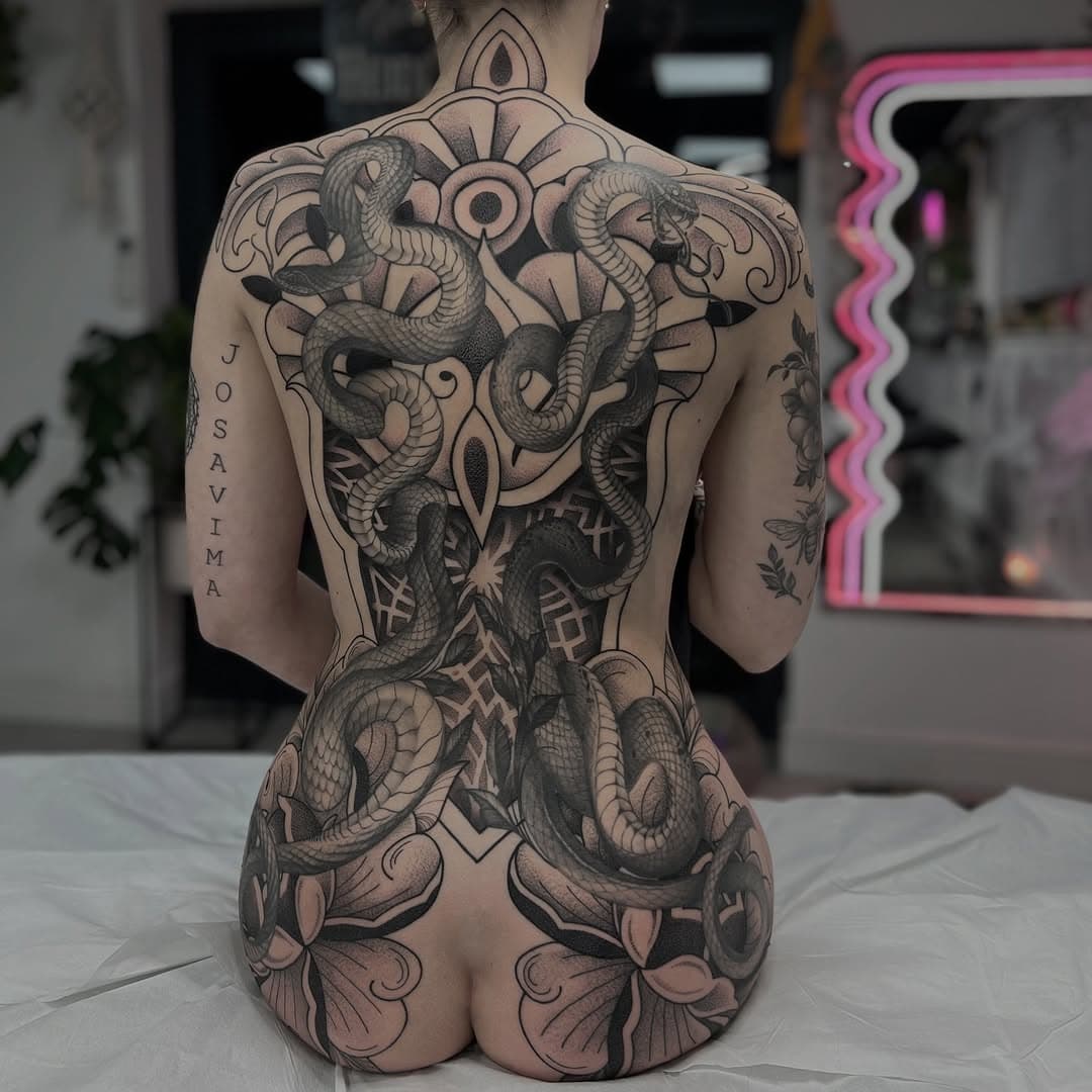 Full back & bum made over three sessions for Saskia who flew from Germany to collect this piece 🥹 🇩🇪 
(Snakes were an existing piece made by another artist which I worked around) 

It’s unusual to be able to start and finish such a large project in a matter of days so this was a super fun experience to see our vision come to life so fast. Thank you to all my clients who fully firm these wicked large scale projects, the dedication doesn’t go unnoticed and It is an absolute pleasure to make these ideas for you all 🫶🏻🫶🏻🫶🏻

If you’re interested in collecting some of my art please email your ideas to: ladyfurey@gmail.com ✨