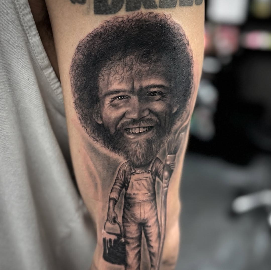 Bob Ross portrait ✍️ “ we don’t make mistakes just happy little accidents “ done by @chrisyoungtattoos 
•
•
For booking contact him directly or send us a DM or email Goldmindstattoo@gmail.com 
•
•
•
#goldmindstattoo #goldmindstattoogallery #ink #chrisyoungtattoos #inkyourstory #portraittattoo #bobross #bobrossportrait #florida #travel #tattoos