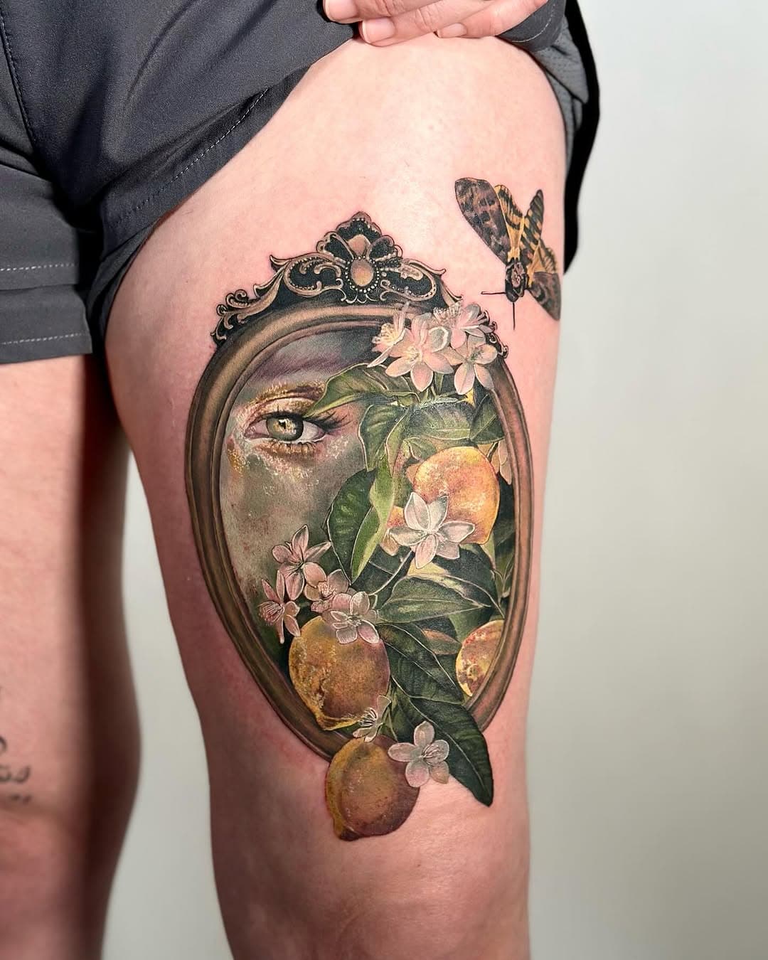 👁️ lovers eye and lemons 🍋
.
Not sure I can accurately express how excited I was when Jenny reached out for this piece; she really went ahead and single handedly brought back all@of my favorite subjects; she asked for a frame, lemons, a moth and an eye. 
On top of all that she traveled from Miami to see me, and sat through two full days like an absolute champion (I am almost sure I was hurting more at the end than she did) 
.
Done in two full days (12 hrs) in Tucson at @laquerida_tucson 
Thank you so much for your company Jenny 🫶🏻
.
If you like this subject matter, I have a couple smaller version of these on my website in the available artist choice projects section and I would love to tattoo them on you 💞
.
.
.
.
.
.
.
.
.
.
#botanicalillustration #botanicaltattooartist #loverseye #lemon #lemontattoo #botanicaltattoo #tucson #tucsontattooartist #arizonatattooartist #downtowntucson #laquerida_tucson #tucsontattoo