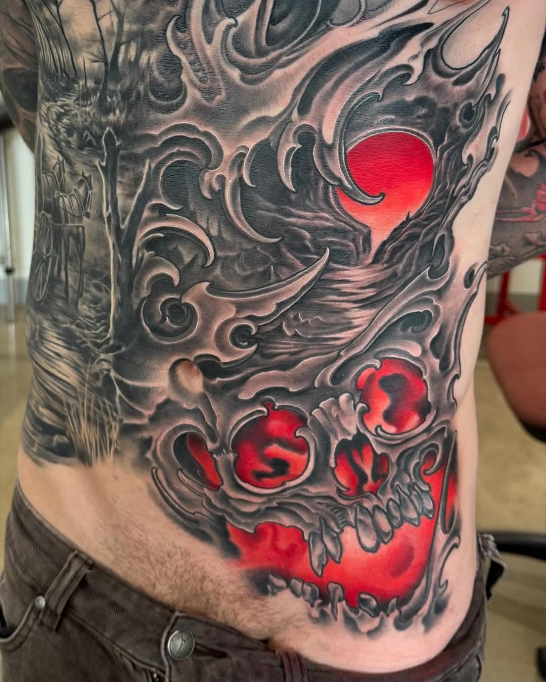Some gnarly and very fun progress on Ty’s torso @southerngunstattoo