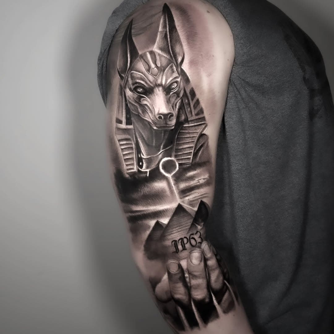Anubis was the most important god of the dead.🖤 
Made with @acus_tattoomachines @jconly_official @dermalizepro 

Booking 
DM or www.rolo-ink.de 

Merchandise 
www.rolo-ink.de 

+++Follow for more+++
#anubis #anubistattoo #blackandgreyrealism #blackandgreytattoo #blackandgreyink #realismtattoo #realisticink #realismotattoo #darktattooart #memorytattoo #jconlyvetar #jconlycartridges #jconlyproteam #acustattoomachines #acustattoo #roloink #tinograetz #tattooartistgermany #tattooworldwide #tattooculture #tattootime #tattooartist #tattoolovers
