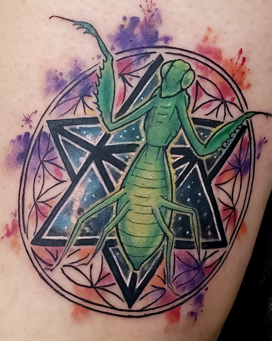 Really great concept for a tattoo does anyone know what the symbol in the back is called I forget