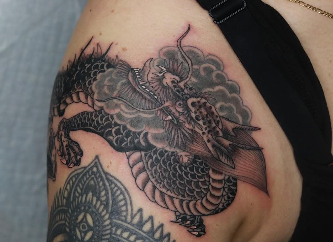 A fun different dragon for Danielle! Made with love @barberselectrictattoo For booking and all correspondence please e-mail barberselectricbooking@gmail.com. Thanks for looking!
 #barberselectrictattooing #barberselectric #barberselectrictattoo #cincinnatitattoo #cincinnatitattooartist #cincinnatitattooshops #barberselectrictattooing #ohiotattoo #ohiotattoos #ohiotattooers #barberselectric #barberselectrictattoo 
#cincinnati #cincinnatitattoo 
#oakley #hydepark #oakleysquare #hydeparktattoo #cannon