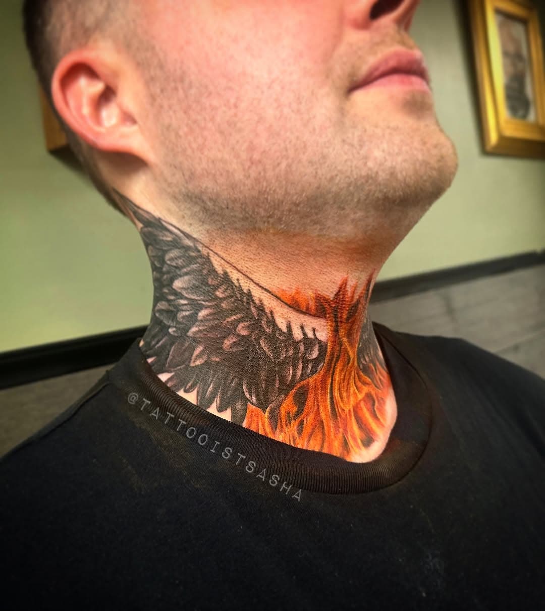 Did this flame and wing neck tattoo a little while back, it’s also a rather large cover up, swipe to see the cover up and a video of it all the way around. Thanks for looking 😊. #necktattoo  #necktattoos #leicestertattooist #leicestertattooartist #leicestertattoostudios #femaletattooartist #uktattooartists #uktattooist #uktattooartist  #colourtattooartist #colourtattooist @realarttattoo