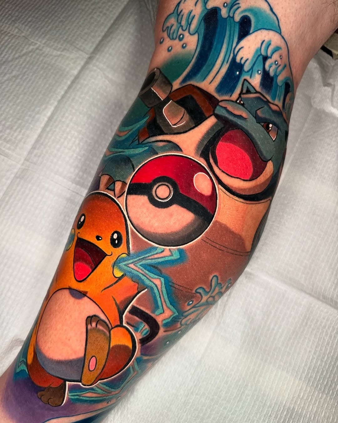 Raichu & Blastoise for @mathis.dylan1234 🌊⚡️ Pokeball was already there so we added his two favorite Pokémon around it! This one wraps to the shin & calf. Thank you soso much for having me do your first big tattoo! 
•
•
•
•
•
•
•
#blastoise #blastoisetattoo #pokemon #raichu #raichutattoo #pokemontattoo #pokemoncommunity #pokemontcg #pokemoncards #pokemoncenter #pokemonswordshield #pokemonfan #pokemoncollection #pokemonfanart #pokemontrainer #pokémongo #pokemonmaster #pokemonscarletandviolet #pokemonarceus #kawaii #kawaiitattoo #animetattoo #nintendo #nintendoswitch #nintendotattoo #nerdytattoos #gamerink #videogametattoo #videogametatts #miamitattoos