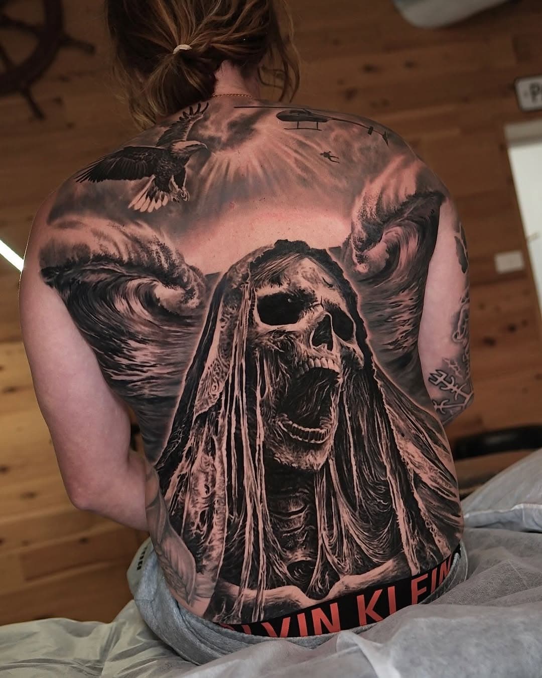 The Reaper 💀 🌊 🪂 
Done on Scotty over 4 days in a row 💪🏻 had fun incorporating his love for surfing and skydiving. Thanks for looking! 
Swipe for progress pics >>>>

📍 @atlnts.studio

Booked closed. Replying to enquiries now! I have replied to a heap of requests. Please check junk folder

Cancellation list is also on my website 
Dylanwebertattoos.com

Sponsored by
@kwadron
@empireinks
@inkeeze
@inkjecta
@tattooarmour_australia 
@ghostlineapp

#sleevetattoo #portraittattoo #australianartist #kwadroncartridgesystem #kwadroncartridge #reaper #grimreaper #skull #skulltattoo #backpiece #wave #surfing #skydive #landscape #realism