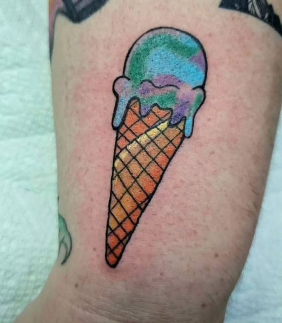 Cool ice cream cone tattoo from @ichigoinktattoos 
•
Drop by the shop to check out some of her flash, 
vist Americantattoostudios.com to book an appointment
•
#americantattoostudios #ichigoink #traditionaltattoo #icecreamcone #colortattoo #clevelandtattooartist #ohiotattooers