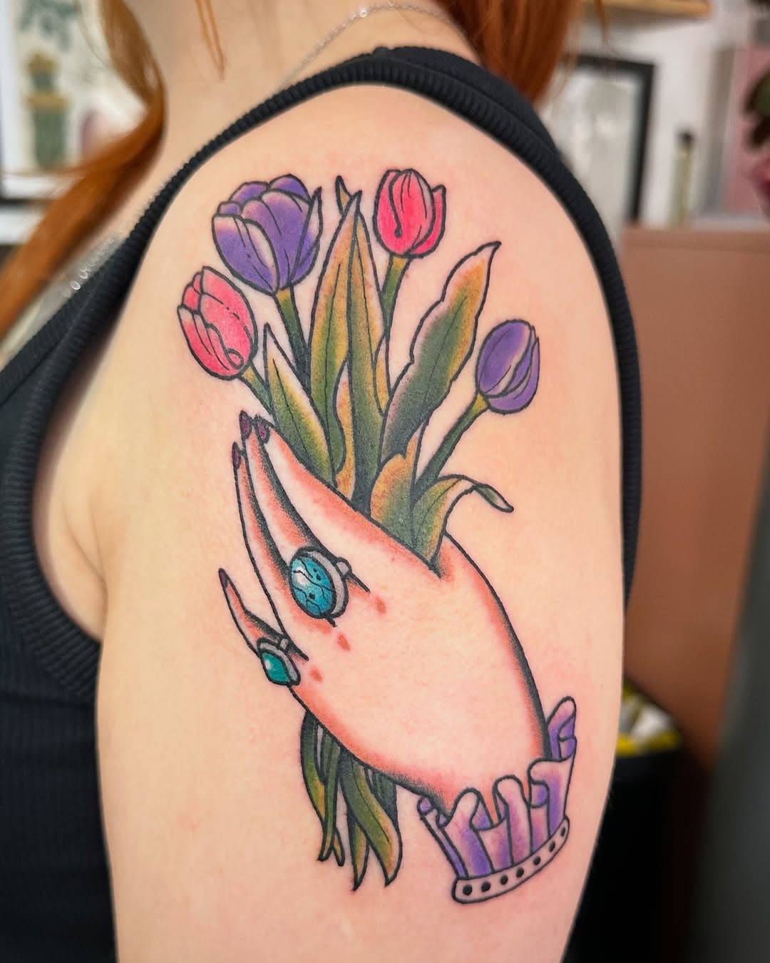 Hand and tulips for Katie 💖I loved doing this for any enquiries drop me a direct message. Done @bloomstreettattoo #manchestertattoo #manchestertattooist #manchestertattooer #tattoo #traditionaltattoo #tradtattoo #floraltattoo #floraltattoos #botanicaltattoo #flowertattoo #oldlines #neotradtattoo #neotraditionaltattoo #bright_and_bold  #tradworkers