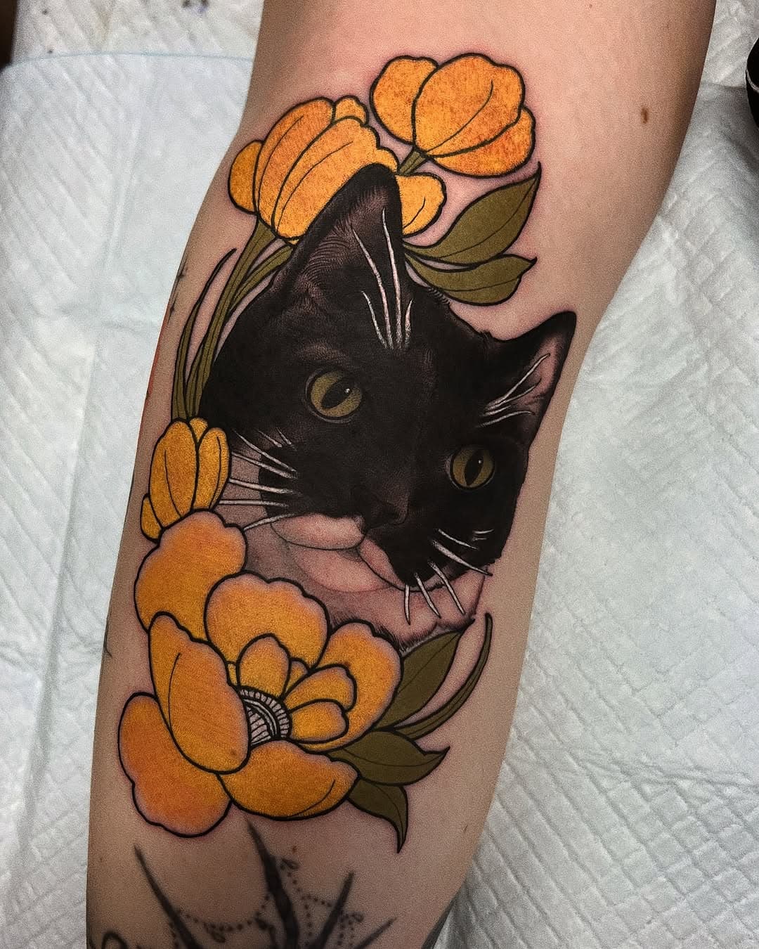 Thank you Steph! 🐈‍⬛ @oldsoultattoostudio * 
* 
*
* 
*
* 
* 
* #tattoos #tattoodaily #TAOT #bodyart #tattooed #inked #ink #tatts #instatattoo #art #tats #design #illustration #instaart #body #neotraditional #instadaily #newtattoo #TattooistArtMagazine #d_world_of_ink #oldsoultattoostudio #cattattoo #animalportrait #colourtattoo #flowertattoo