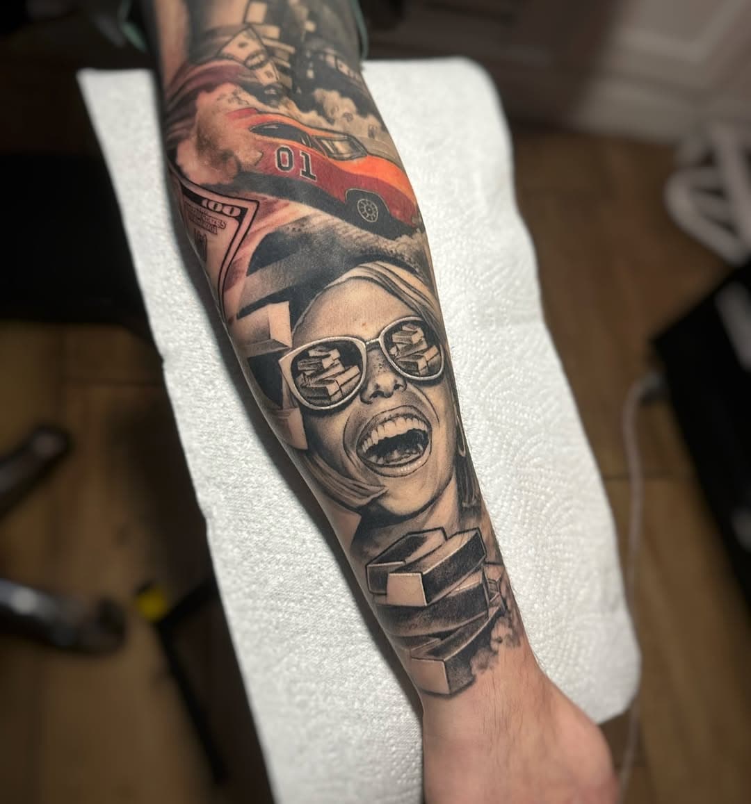 Almost completed this one.
Bonnie and Clyde theme. Got some colour to add to the gold bars. #blackandgreytattoo #bonnieandclyde #healedtattoo #gold