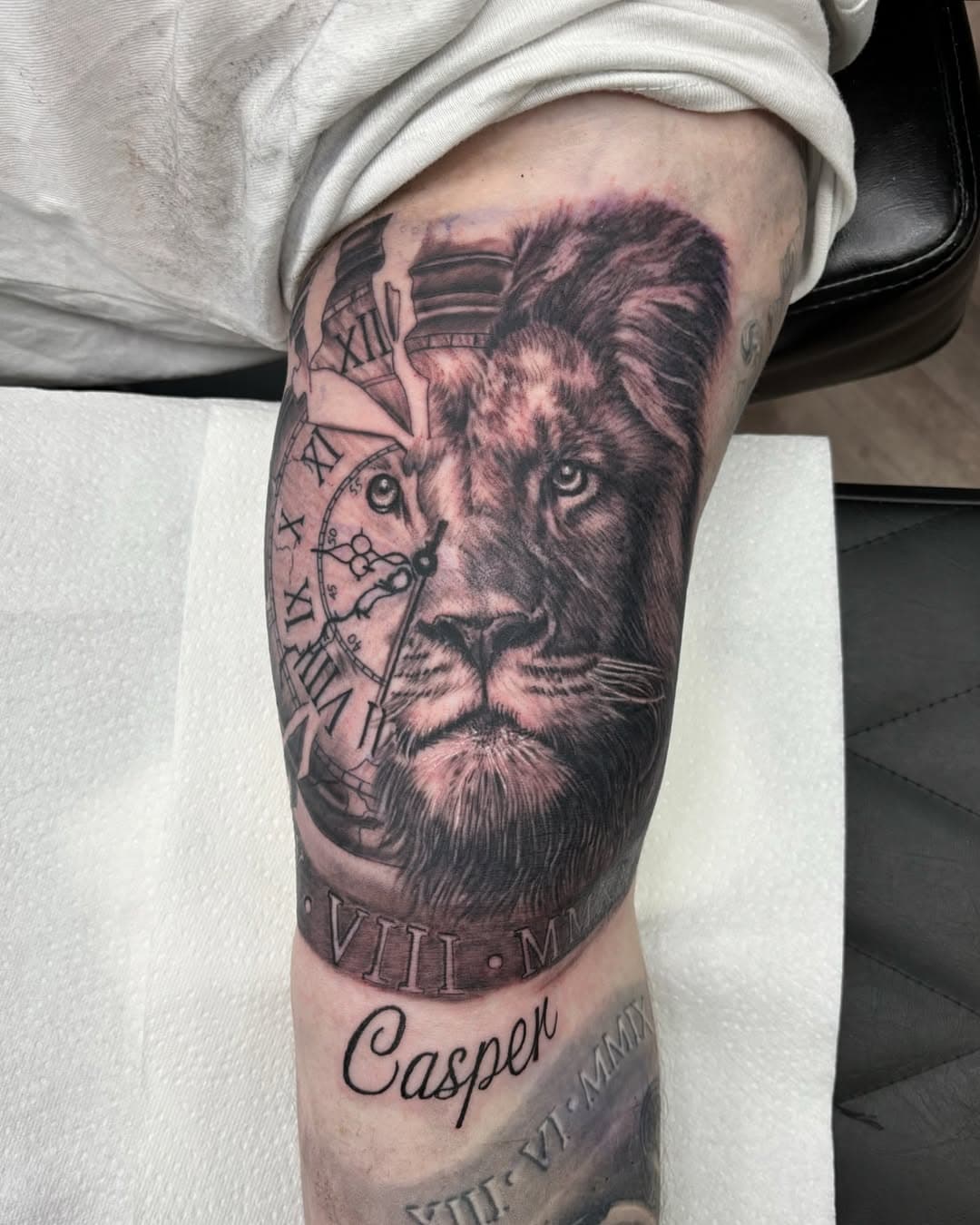 Inner bicep brilliance by Rich, with this lion and clock face morph.