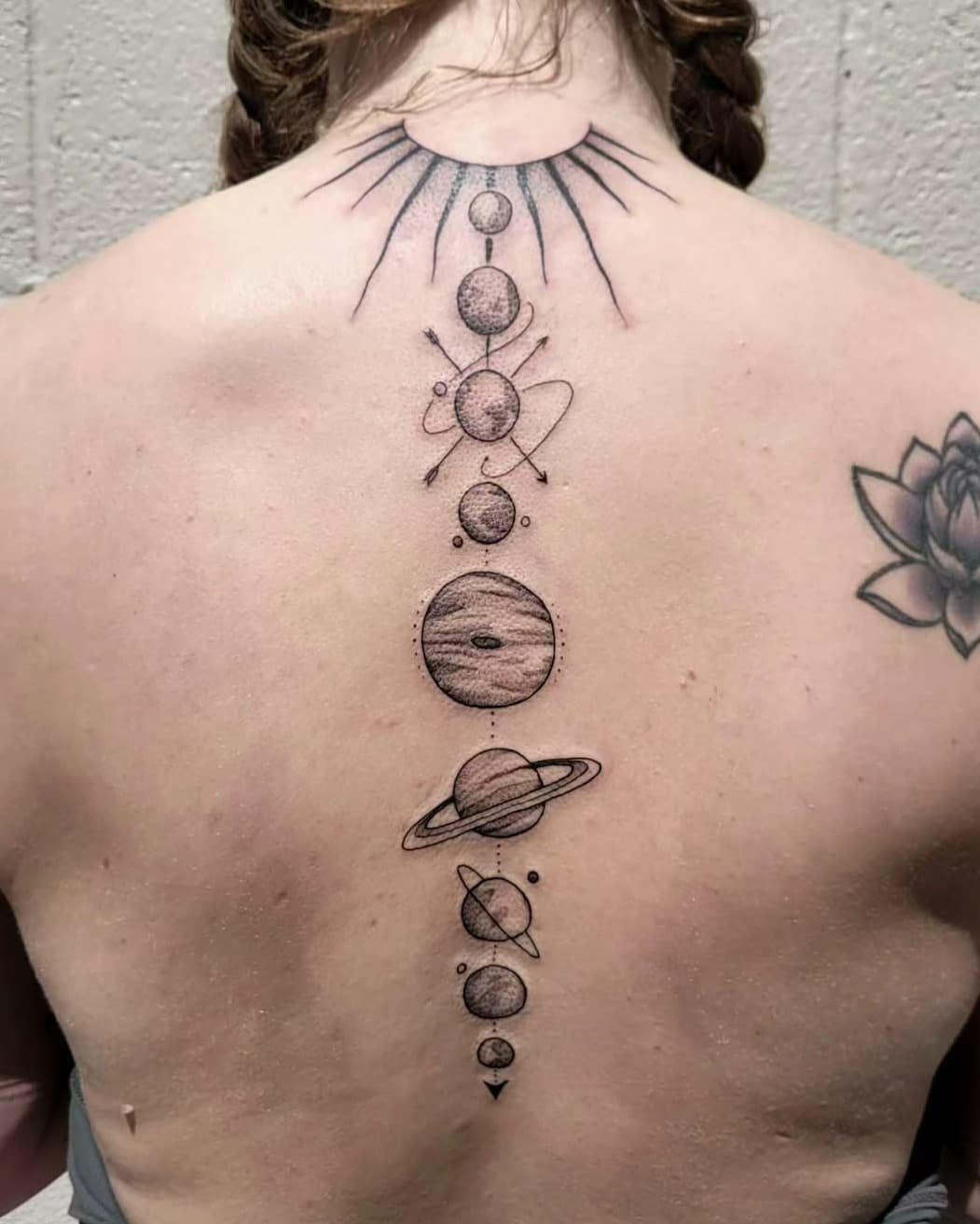 Cosmic vibes all the way down the spine ✨🌌 Amazing work by Emily. #solarsystemtattoo  #spineink  #tattooartist