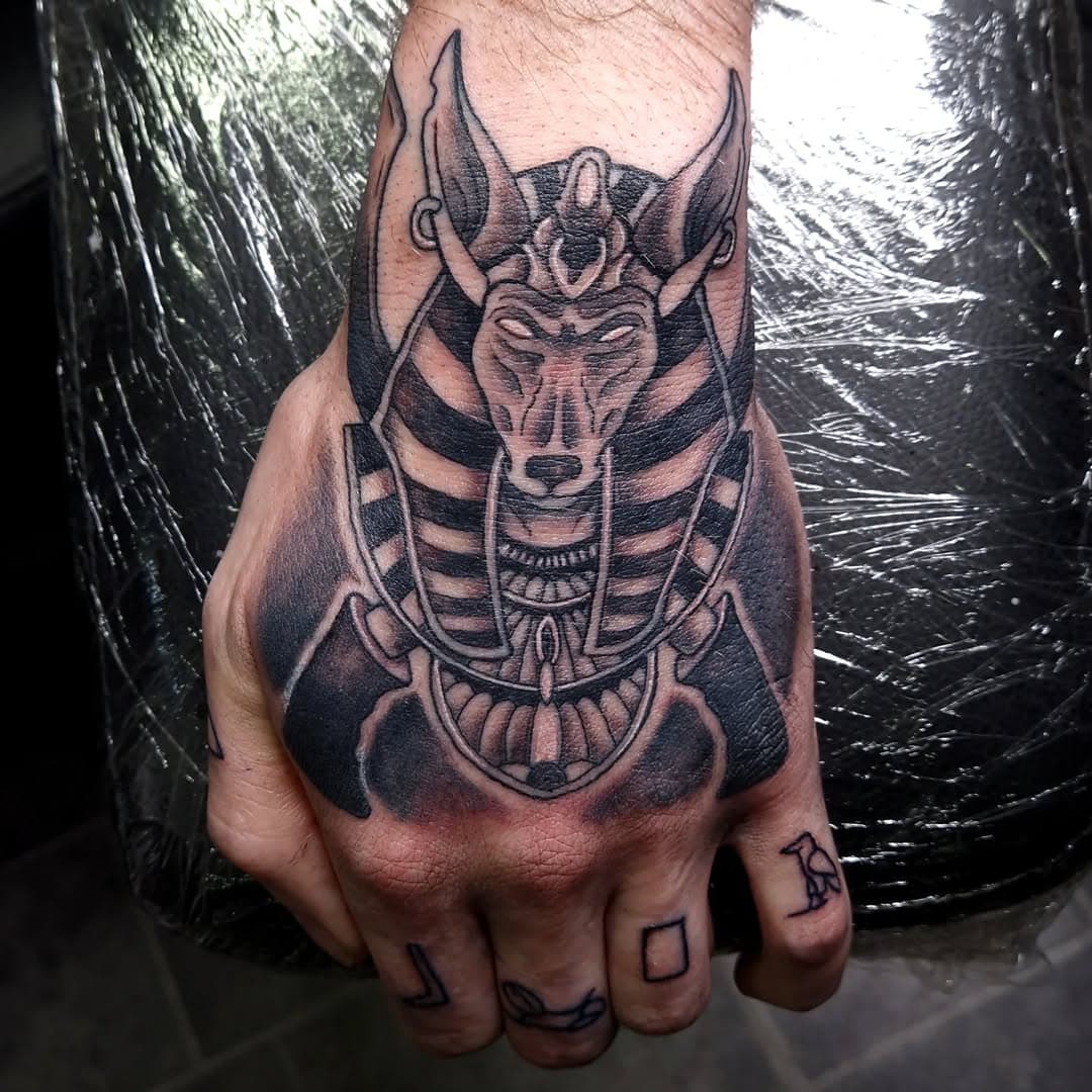 Anubis hand tattoo from today.

#Anubis #Egyptiangod #underworld #mumification #history #death #dying #blkngrytattoo #handtattoo #ink #studio #nile  @nile_official
@thewrightink_tattoos @dermaglotattoosuppliesuk #dermaglotattoosuppliesuk 
#egotattoomachine 
#daviewrightfacebook 
#followers