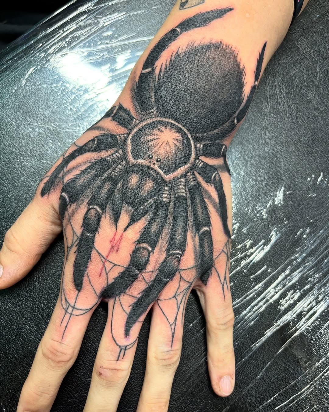 Had an absolute blast doing this spider hand jammer yesterday on a awesome client that just let me do me! If you’re looking to book I have some limited spots left this month and I’m booking march and April right now. Shoot me a dm or email and let’s fill the year with sick tattoos like this. As always thanks for looking and your guys continued support! 
.
.
.
.
.
.
.
.
.
.
.
.
.
.
.
.
.
.
.
.
.
.
.
.
.
.
.
.
.
.
.
.
.
.
#tattoo #tattoos #tattooart #tattooartwork #tattooartist #blackandgreytattoo #handtattoo #spider #blackandgrey #art #artist #ink #inked #phoenix #arizona #scottsdale #tattooshop #gildedcreationsaz #tattooist #tattoostyle #tattoostudio #tattooidea #darkart #illustration #blackwork #workhard #stayhumble