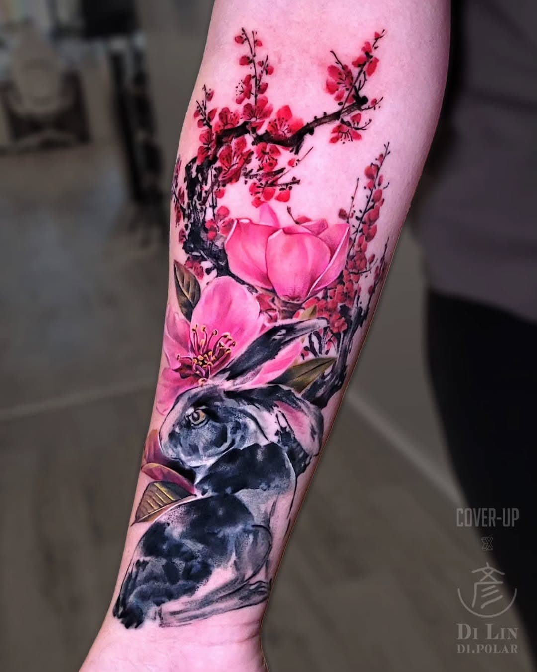 🐰🌸 Cover-up of a concept that's "same same, but different". Swipe to see the original! 
 📢 Booking for May 2025- send me your tattoo ideas via the link in my bio 🔗✨
. 
Thank you CF for letting me revamp your arm. 🙏
Hope everyone's surviving the weather ❄️ much better this year. No more getting stuck in traffic for 7 hrs(?) 😂
.
.
.
#dipolardoodles #rabbittattoo #canadatattoo #vancouvertattooartist #femaletattooers #bunnytattoo #femaletattooartist #inked #tattoo #tattooinspo #vancouvertattoo #liquidambertattoo #ladiesoftattooingworldwide #tattooart #tattoolovers #qttr #tattoodesign #tattoorealistic #colorrealism #tattoosofinstagram #tattooartist #coveruptattoo #cherryblossomtattoo #flashtattoo