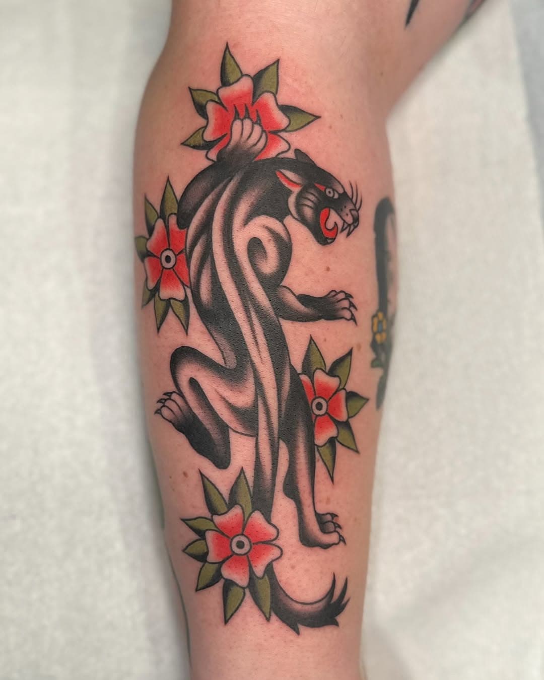 Loved making this panther for Zach who’s a power lifting restorative justice coordinator. More of all of this please! <3<3 @icontattoo

*
*
*

#panthertattoo #flowertattoo #pdxtattoo #pdxtattoos #pdxtattooartist #portlandtattoo #portlandtattooartist #traditionaltattoo #tattooflash #traditionalpanther