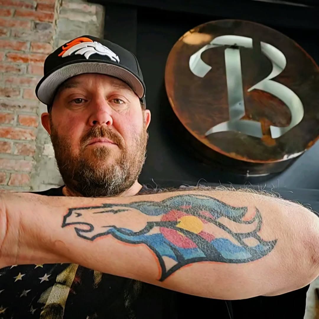 Loyal clientele mean the world in the tattoo industry and here is one of @phil.boundbydesign's loyal clients showing off several pieces done with Phil. 

From bold sports logos to sleek lettering and lifelike animals; phil does it all it. No wonder he has such loyal clients. Become one of them today by contacting the email listed. 

#Colfax #Denvertattoo #Tattootradtional #Versatile #Loyal #BoldAndTimeless #Crispylines