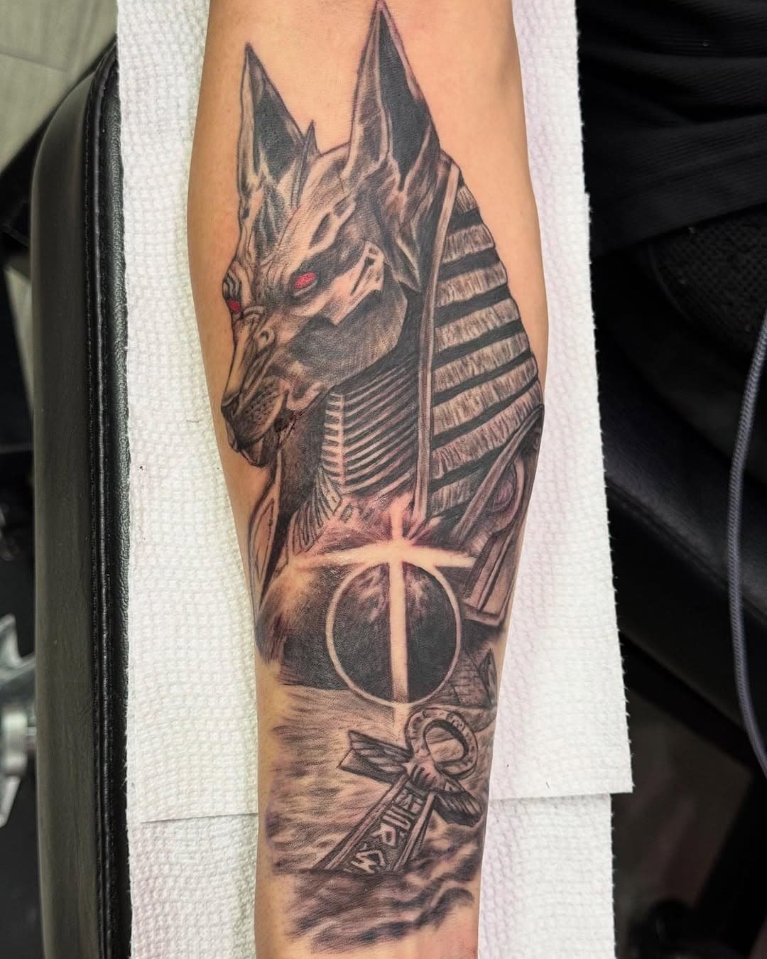 Guardian of the afterlife, etched in ink. ⚫🔺 Beautiful tattoo done by Kristin! She has a couple of openings left for this month. Be sure to schedule! 📅 📍13520 Perkins Rd. (Off Siegen Ln. By the St. George Fire Dept.)225.223.6477📱! #tattoo #ink #tattoos #inked #tattooer #inkedup #tattooing #inklife #tattooist #art #tattoolife #bodyart #tattooshop #piercings #tattooartist #bodypiercings #tattoostudio #BatonRouge #tattooedlifestyle #getinked #sacredarttattoo #Louisiana #shoplife #gettattooed #sacredarttattoostudio #LSU #blackandgreytattoo #geauxbr