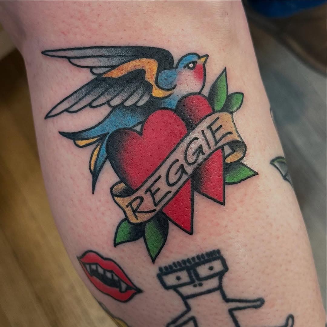 @cookietattoo made this memorial for Ryan today, walk in style. Thanks for coming in today, hope this tattoo brings you peace. Rest easy, Reggie!
.
.
.
.
.
.
.
. 
:
.
.
.
.
..
.
#gracelandtattoo #memorial #radtrad #boldtattoos #oldlines #bright_and_bold #hudsonvalley #hudsonvalleytattoos #hvtattoos #bohv #wappingersfalls #villageofwappigers