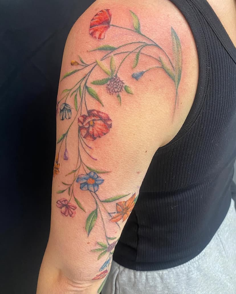 Some florals to make your day. #wildflower #wildflowers #flowers #floral #flora #color #wildflowertattoo #tattoo #tattoos #wraparound #wraparoundtattoo