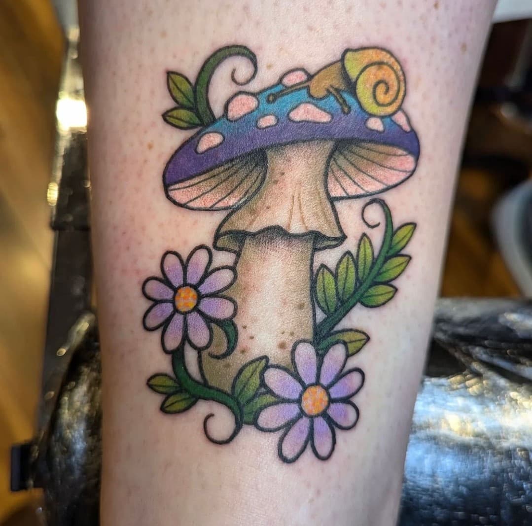 Fun one by Luna @funalaith Thanks for lookin! 🍄🐌🌸 #mushroomtattoo #naturetattoo #groovytattoo