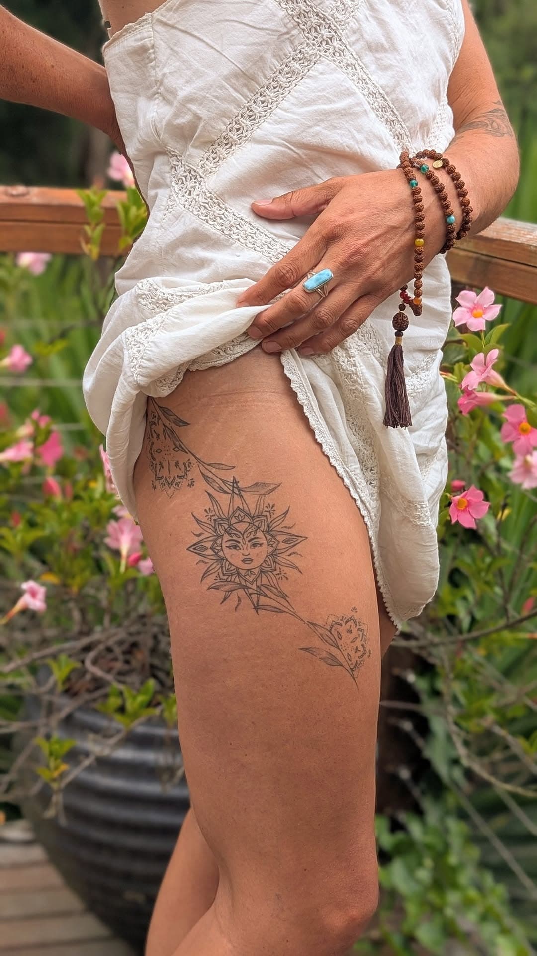 Eight months healed ✨ Amy’s leg piece, featuring an ornamental sun and delicate florals, flows beautifully with her form. Grateful to create lasting art like this! 🌿🌞 

#FinelineTattoo #HealedTattoo #Redhill #redhill #intuitivetattoo