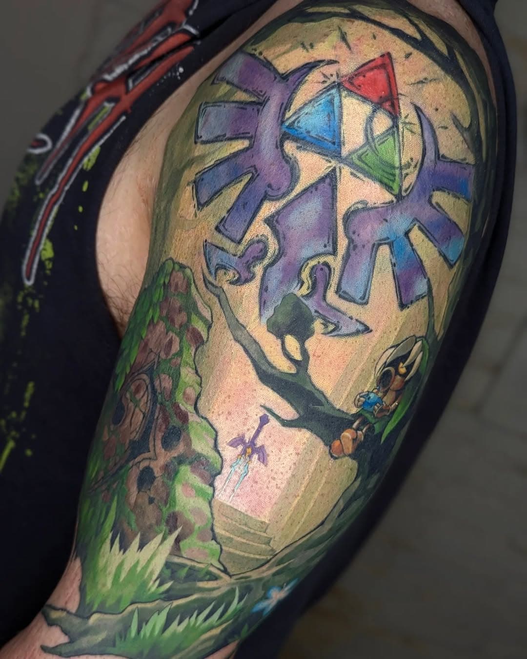Legend of Zelda nature scene for Alex. The Hylian symbol on the shoulder and the bass clef on the bicep were both existing tattoos that I incorporated into this piece. A very fun challenge and a great opportunity to practice some painterly rendering throughout. Also, possibly the most green I've ever put into one tattoo, at least since the Pan-inspired faun I did in 2023.

Thank you for your trust and patience, Alex, I really appreciate the passion you had for the project🙏🙏🙏

----

#legendofzelda #zeldatattoo #crownandfeather #phillytattooartist #videogametattoos #customtattoo #lordlexantattoos