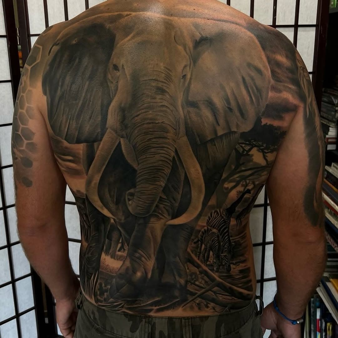 Amazing black and grey elephant and full back piece by Alex with other animals in the background! Alex would love to do some more full back pieces so please email him to enquire! 
.
.
.
.
#tattoo #tattoos #tattooist #tattooer #tattooing #blackandgrey #blackandgreytattoo #realistic #realistictattoo #elephant #elephanttattoo #zebra #zebratattoo #safari #safaritattoo #backpiece #backpiecetattoo #dynamic #barberdts #killerink