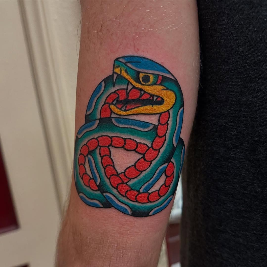 Ouroboros pretzel style done at @classicfullerton Now booking appointments for March!