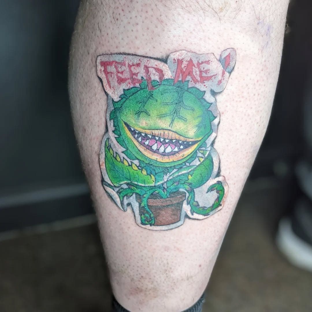 * AUDREY II *
One of my favourites of the year so far 💚
Would love to do more stickers when I'm back to work (April all being well)
DM @nat_headstone for booking & info 
Thanks 

#audrey2 #audrey2tattoo #stickertattoo #audreyii #audreyiitattoo #littleshopofhorrors #littleshopofhorrorstattoo #flashtattoo #cooltattoo #funtattoo #colortattoo #colourtattoo  #dannystattoocollective #dannystattoosupplies #imperialinks #dermagloink #tattoonottingham #tattooistnottingham #tattooartistnottingham #nottinghamtattoo #nottinghamtattooist #colourtattooist #colourtattooistnottingham #colourtattoonottingham #nottinghamtattooartist  #nottinghamtattoostudio