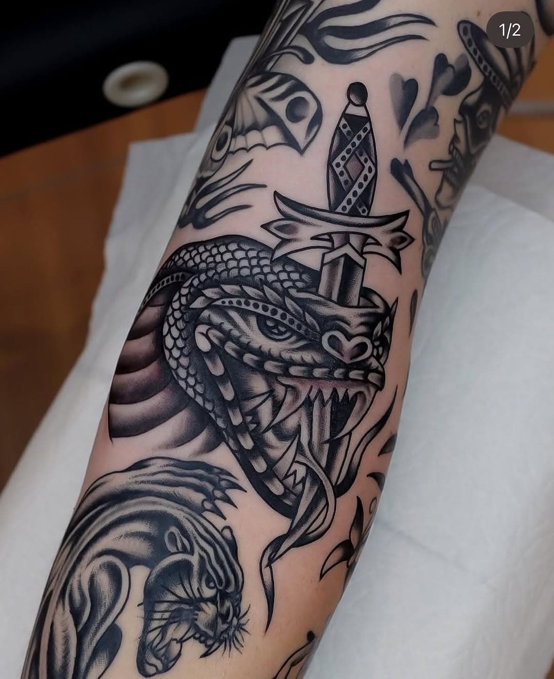 Filling the gaps on Vaughn’s arm! I’m happy how is coming out so far! My bookings for March and April are open! Please follow the link in my bio to book your next tatt👀
.
Follow my new channel I opened to see last minute cancellation!
.
Done @goodmarkstattoo 
Using @tigerspitbalm.au