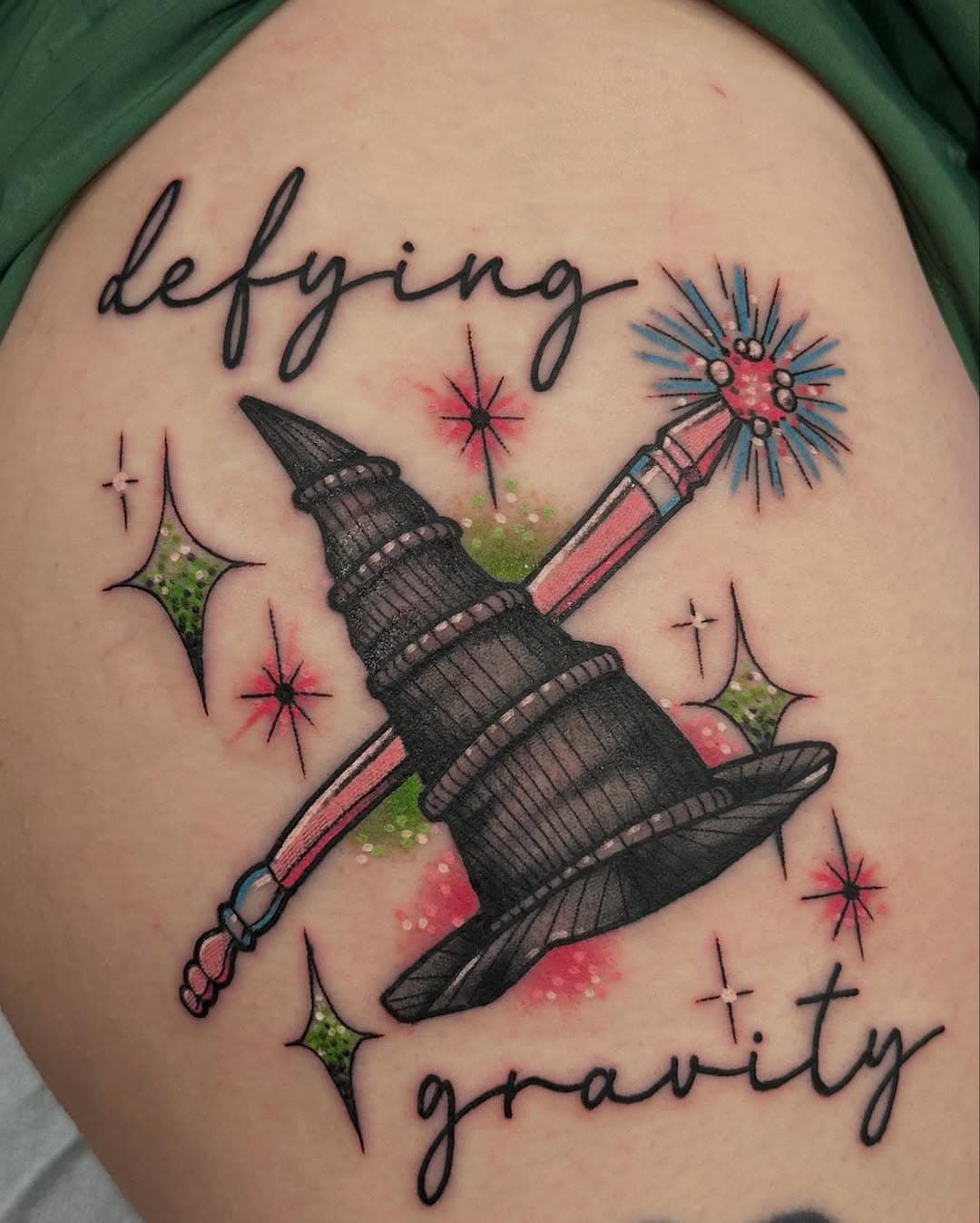 “Defying Gravity” for @betweenthetides made today by @cookietattoo who’s down with the Wicked craze?!?!
:
.
.
.
.
.
.
:
.
.
#defyinggravity #wicked #wappingersfalls #villageofwappingers #gracelandtattoo #hudsonvalley #hudsonvalleytattoos