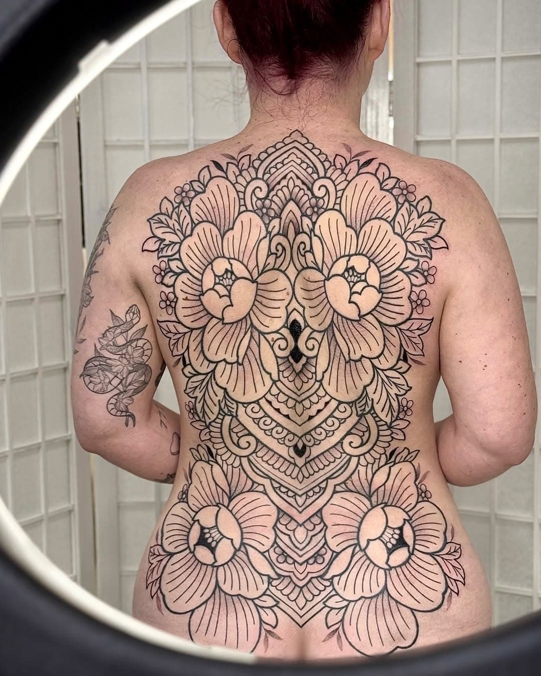 This week I finished this project for the lovely Niamh 💞 

This was definitely a process that I have thoroughly enjoyed from start to finish. Niamh started with a day session where we realised that day sessions aren’t for everyone! It was a great opportunity to map out the piece but we agreed that it’s much better to leave an appointment feeling good and not pushed to the limit 🫶🏼 The next 3 sessions were done in 3 hour stints. We built up the piece gradually, working to Niamh’s time limits and to be honest, this just gave us more time to think through details 😁I would always much rather someone leave feeling all ok and ready for more, than regretting being on the bed for 5,6 or more hours! 

Thank you so much @niamhmorrissss 🩷 this project has been SO much fun and it’s been a pleasure chatting with you every time! 

To anyone who would like a similar style or scale project, please feel free to message with any questions or to book. If it appeals to you to do something similar over smaller sessions, I am always open to that! 😁 

Sponsored by @butterluxe_uk @getink.app & @wbjtattoo 🖤 

#tattoos #tattooist #londontattoos #essextattoos #blackworktattoos #backtattoo #dotworktattoo #floraltattoo #peonytattoo #backpiece #spinetattoo #ornamentaltattoo #boldwillhold #dotwork #linework #essextattooist #femaletattooist #londontattooist #customtattoos