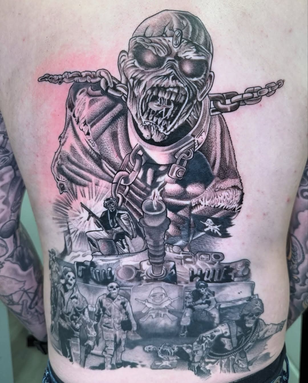 Iron Maiden back piece in progress by @wesdtc 
Request an appointment online. burningheartstattoo.com