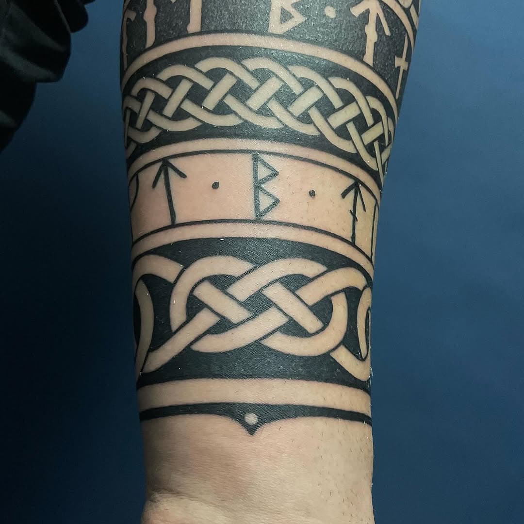 Celtic bracelets and runic inscriptions. Freehanded appart from the middle section of Knotwork. Done over a day and a half at @walhalla.ink München . First tattoo for Oliver #celtic #celtictattoo #nordic #nordictattoo #viking #vikingtattoo #norse #norsetattoo #knotwork #celticknotwork #knotworktattoo