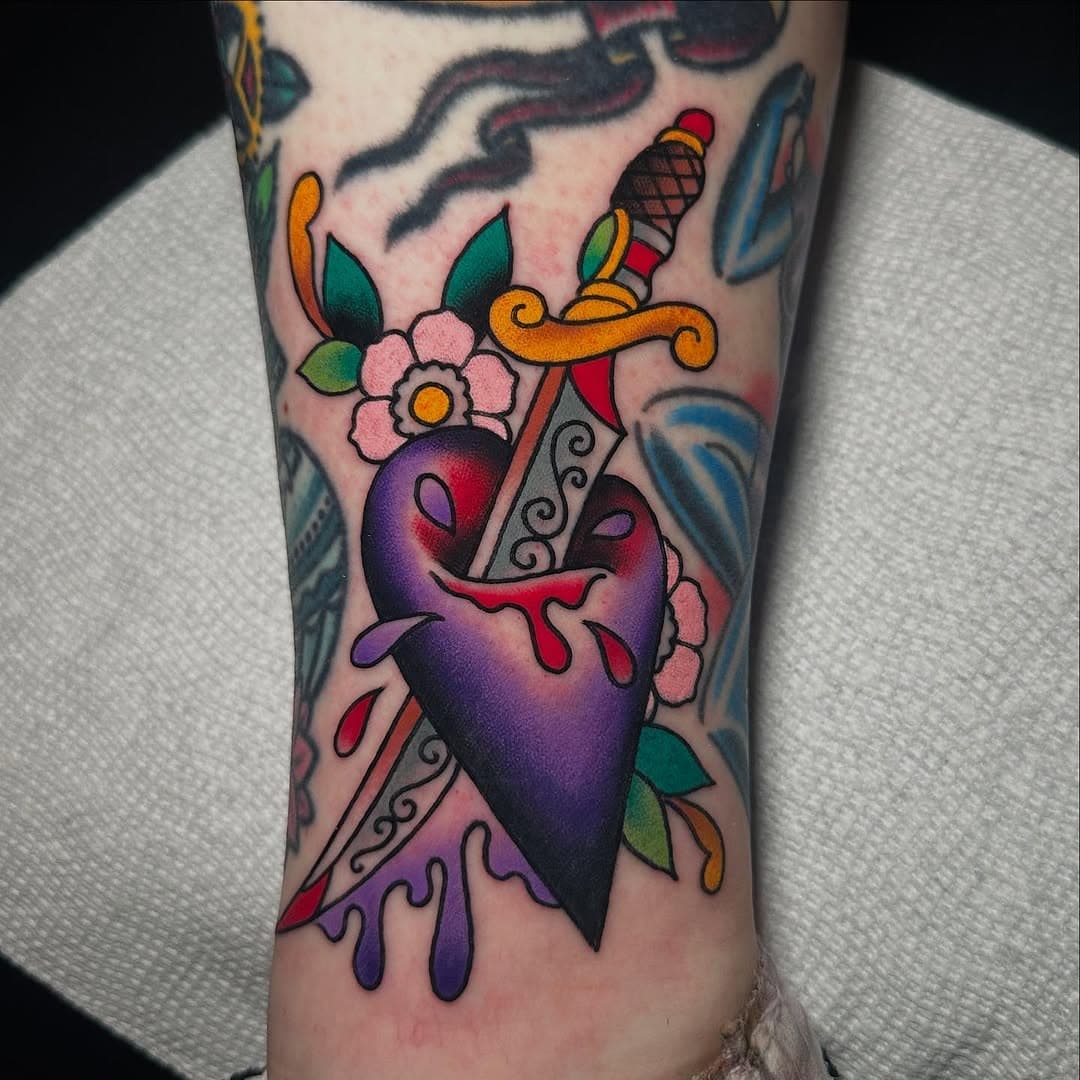 I got to do this purple heart on Valentine’s Day on my great friend @shegottaknow. I love making tattoos fit gaps like this! All these colors are @revolution__ink. They’re a pleasure to use and go in very easily.