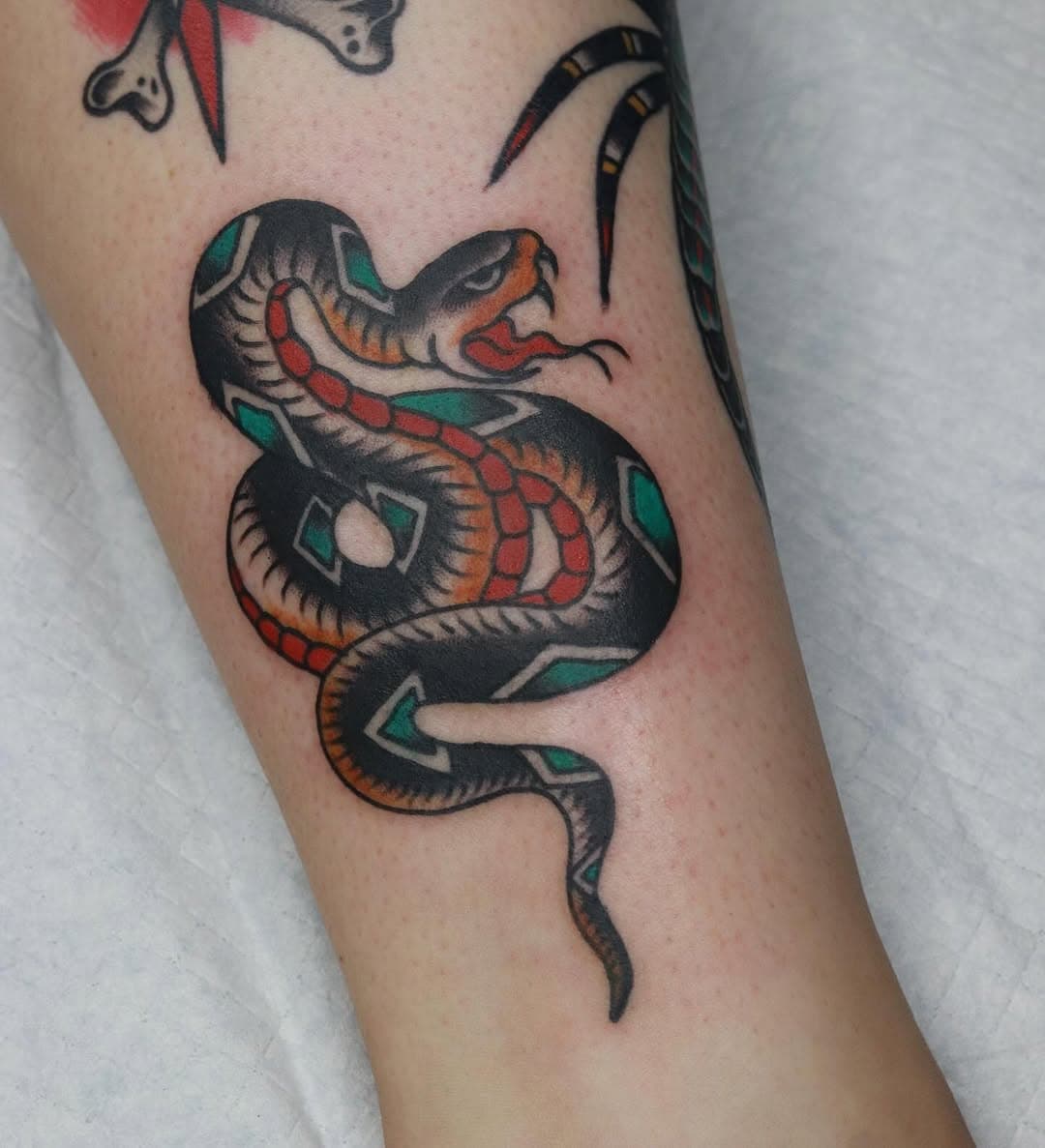 Snake for McKayla and some more life. Made with love @barberselectrictattoo For booking and all correspondence please text or call 513-968-TATS (8287) Thanks for looking!
 #barberselectrictattooing #barberselectric #barberselectrictattoo #cincinnatitattoo #cincinnatitattooartist #cincinnatitattooshops #barberselectrictattooing #ohiotattoo #ohiotattoos #ohiotattooers #barberselectric #barberselectrictattoo 
#cincinnati #cincinnatitattoo 
#oakley #hydepark #oakleysquare #hydeparktattoo #cannon