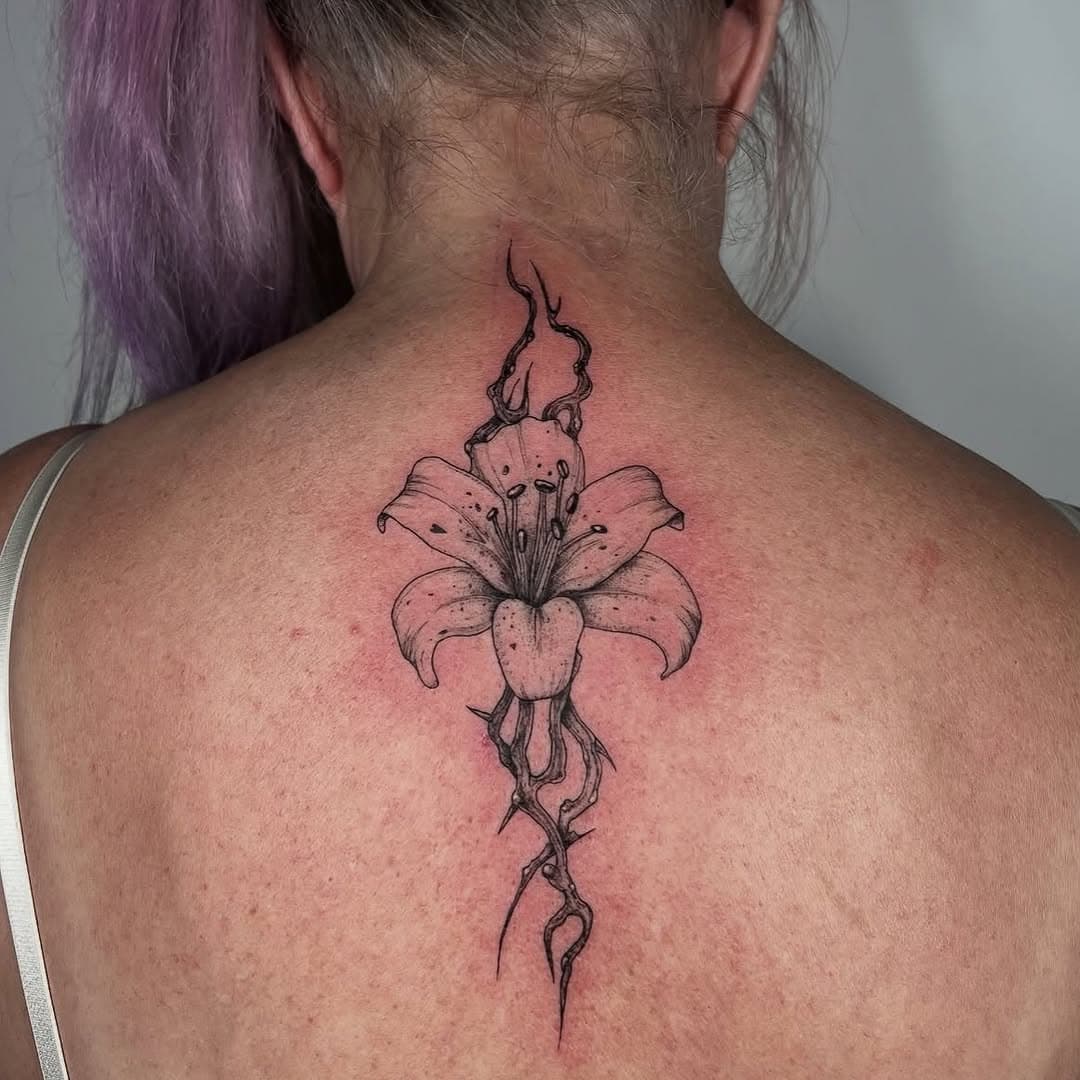 Beautiful custom Lily 🌺 by - @reneeorlandotattoo 
.
.
.
.

For inquiries or bookings, feel free to email us or send us a DM—we’re here and ready to assist!
.
.
.
.
Your idea or our artists designs, let’s chat! Email us for booking or enquires 
Bookings: info@fullmoontattoo.com.au
Contact: (03) 9510 1892
__________________________________________________________
#fullmoontattoo #fullmoontattooparlour #blackandgreytattoo #lineworktattoo #neotraditional #blackandgreyportrait #sketch #realistictattoo #realism #tattooed #tattooist #tattoos #tattooart #tattoooftheday #colourtattoo #tradtattoos #prahrantattoo #melbournetattoo #customtattoo #backtattoo #lilyflower #lilybloom #bloomtattoo #floraltattoos