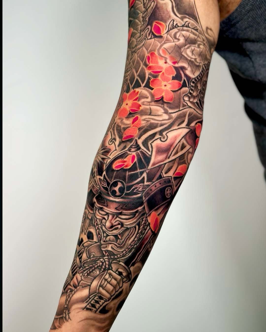 Intricate lines, delicate details, and a touch of red and pink -this tattoo is a fusion of tradition and bold color. 

Book with @ct_hontattoo  for stunning colour and black and grey Asian style tattoos! 

#asianstyle #colourtattoo #blackgreytattoo #floraltattoos #popofcolour #hontattoo