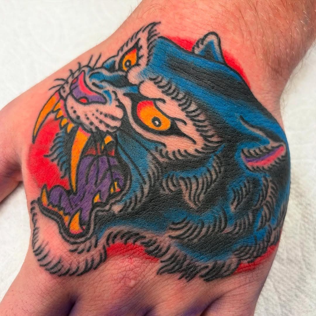 Sabertooth hand situation, lil cover up in there too. Let’s tattoo more big cats 😬 

#torchtattooshop #anaheim #tattoo #traditionaltattoo #orangecounty #orangecountytattoo #bright_and_bold #americantraditional #tattoosnob #tradworkers #oldlines #americanatattoos #sabertoothtiger